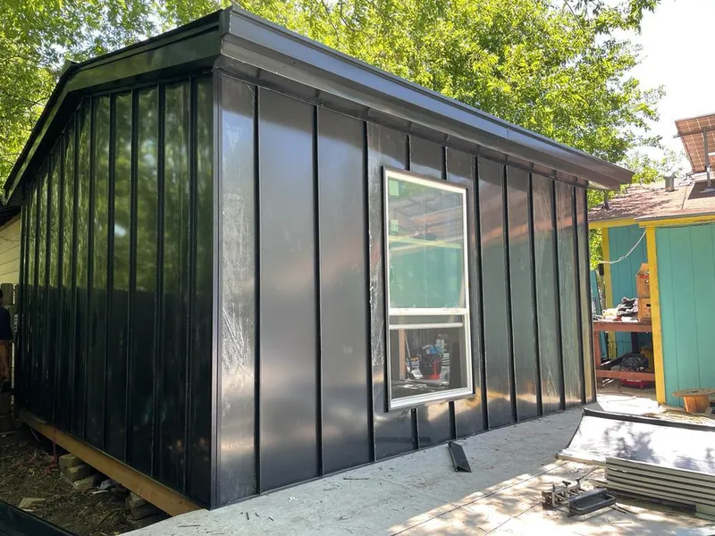 Black standing seam metal wall panels for Roof Inspection in Grand Prairie