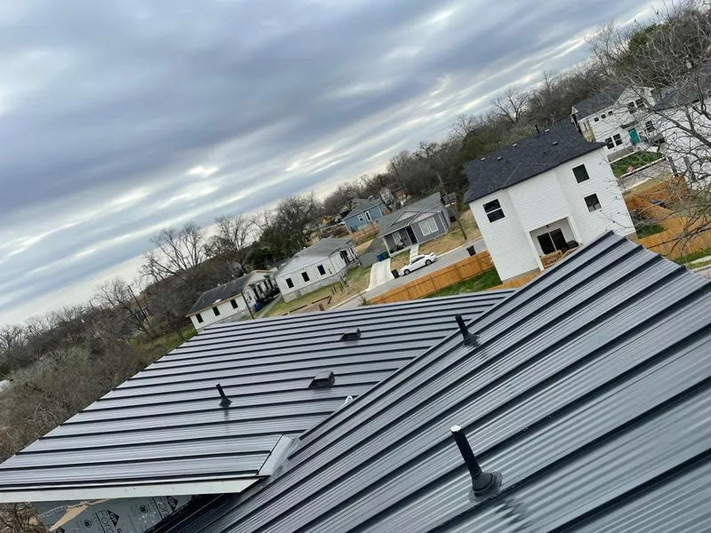 Standing seam metal roof panels with vents for Skylight Repair in Grand Prairie